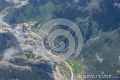 A river, fields and village at valley in China Stock Photo