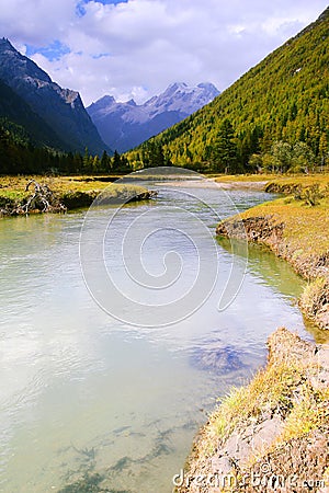 River flow among the mountains in Siguniang Mountain Scenic Area Stock Photo