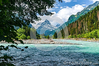 The river flows in a deep gorge, the mountains of Caucasus Stock Photo