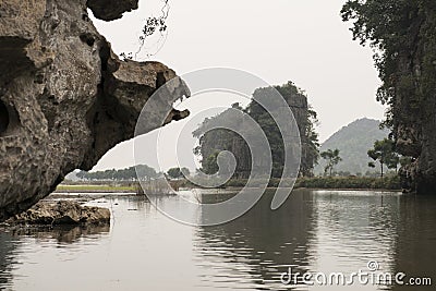 River and karst mountains. Nimh Binh, Vietnam. Stock Photo