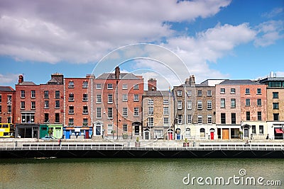 River Liffey and colorful buildings in Dublin Stock Photo