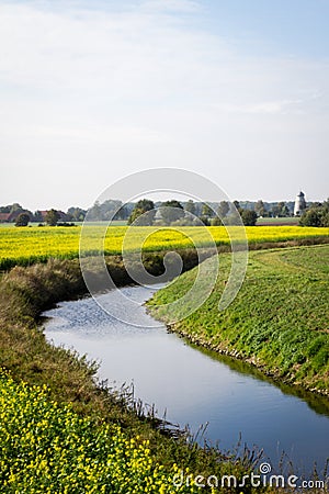 A river meanders through fields Stock Photo