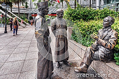 The River merchants, bronze sculpture at the riverbank in Singap Editorial Stock Photo