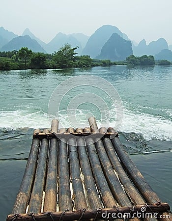 River, Mountain and Bamboo raft Stock Photo