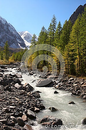 River, mountains and trees. Stock Photo