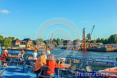 River public transport ferries and passenger river buses on routes on the Elbe River Hamburg Germany Editorial Stock Photo