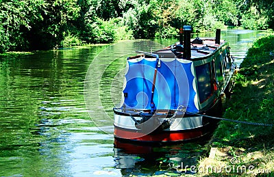 River scenery with a narrowboat Stock Photo