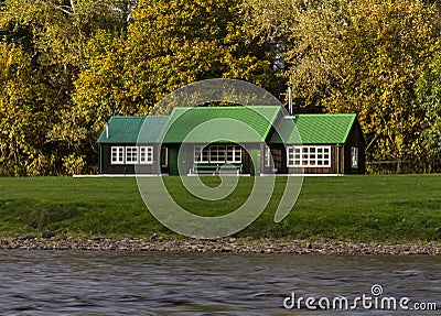River Spey and green hut. Stock Photo