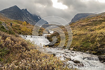 River stream coming down from the mountains of Hurrungane in Jotunheimen, Norway Stock Photo