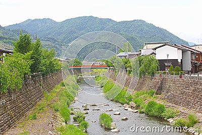Panorama mountains river bridge village Hida Furukawa, Japan Stock Photo