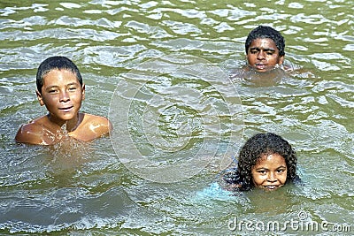 In the river swimming children in tropical Brazil Editorial Stock Photo