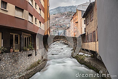 River Valira on Engordany Bridge and houses view in a snowfall day in small town Escaldes-Engordany in Andorra on January 16, 201 Editorial Stock Photo