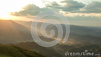 A river and a valley during sunset Stock Photo