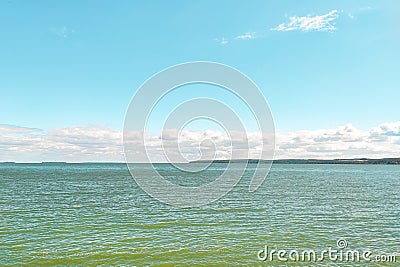 River water is green due to algal blooms. Stock Photo