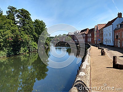 River Wensum and Historic Buildings, Norwich, Norfolk, UK Editorial Stock Photo