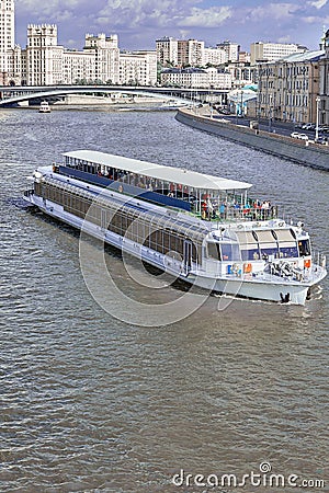 Riverboat sailing on the city river. Walks on river boats. Concept rest in the city, city walks, tourism. Editorial Stock Photo