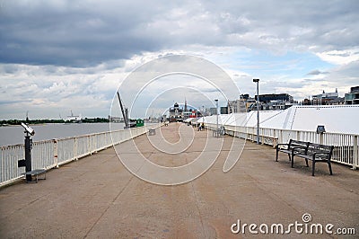 Riverfront promenade alongside Scheldt river outside of Het Steen, Antwerp Stock Photo