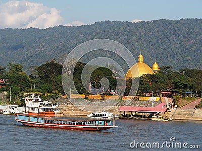 Riverscape tourist boats and business scene over MEKONG river, at GOLDEN TRIANGLE Editorial Stock Photo