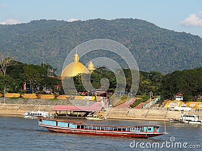 Riverscape tourist boats and business scene over MEKONG river, at GOLDEN TRIANGLE Editorial Stock Photo