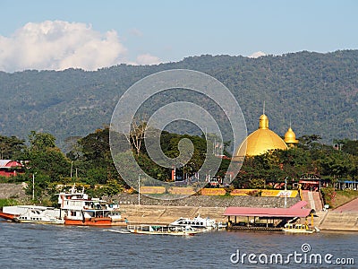 Riverscape tourist boats and business scene over MEKONG river, at GOLDEN TRIANGLE Editorial Stock Photo