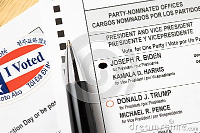 Riverside, California, USA - 10/2020: Pen Laying on Biden Voted Official Ballot with Instructions and I Voted Sticker On Table in Editorial Stock Photo