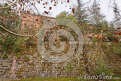 Riverside deserted 1970s` workshop of boiler factory in cloudy winter Stock Photo