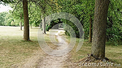 Riverside Park Trail lined with trees Stock Photo