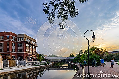 The Riverwalk in Naperville, IL at Sunset Editorial Stock Photo