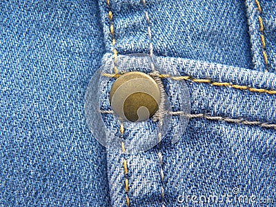 Rivet on blue color jeans Stock Photo