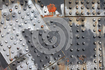 Rivets and rust horizontal industrial steel girder background Stock Photo