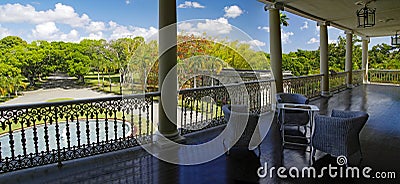 Typical colonial balcony with place for relax of the Chateau de Labourdonnais Stock Photo