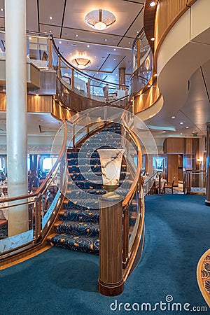 RMS Queen Mary 2 Britannia Restaurant staircase Editorial Stock Photo