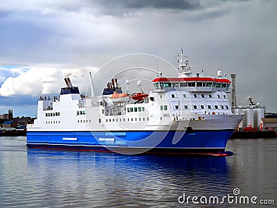 Passenger Cargo Ferry Leaving Port. Stock Photo