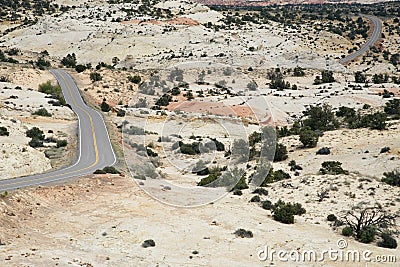 Road through barren desert elevated view Stock Photo