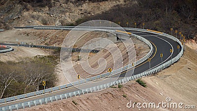 Road bend with inclination to the right side Stock Photo