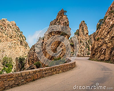 Road through the Calanches de Piana in Corsica Stock Photo