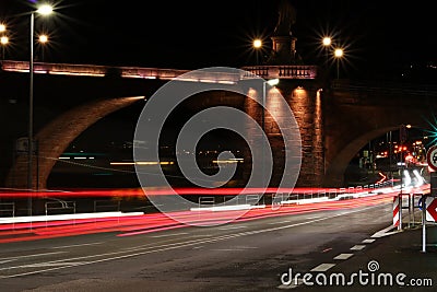 Road in the city illuminated by lights. Night. Stock Photo