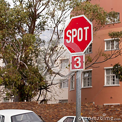 Road, city and outdoor with stop sign, mistake or typo for humor with comic text in neighborhood. Spot, error and joke Stock Photo