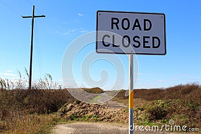 Road closed sign at the end of Texas Highway 87 Stock Photo