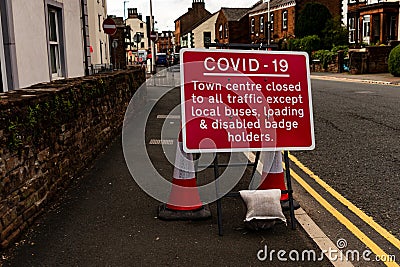 A road closure sign for Covid-19 social distancing Stock Photo