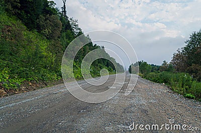 The road into the clouds, nasty weather Stock Photo