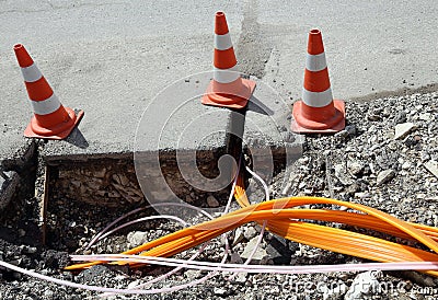 Road construction with pipes for laying optical fiber Stock Photo