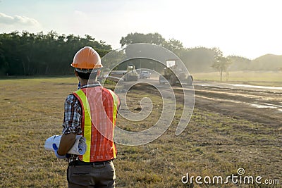 Road construction supervisor Currently viewing work and planning road construction Stock Photo