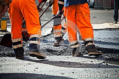 Road construction, teamwork Stock Photo