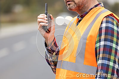 Construction workers talking to walkie-talkie Stock Photo