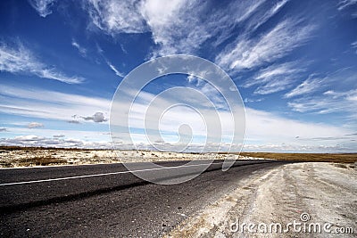 Road on cretaceous mountains Stock Photo