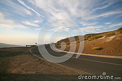 Road curve in mountains Stock Photo