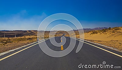 Road in desert Stock Photo