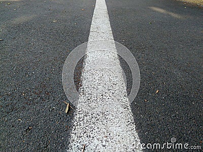 Road with a dividing strip, an original photo, gray texture Stock Photo