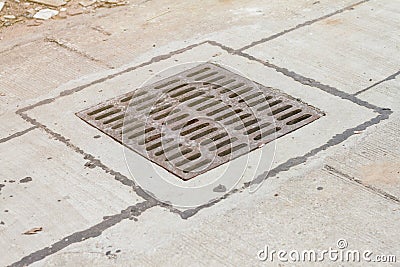 Road drains-Drain on concrete road in Thailand Stock Photo